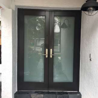 Impact double entry doors with frosted glass