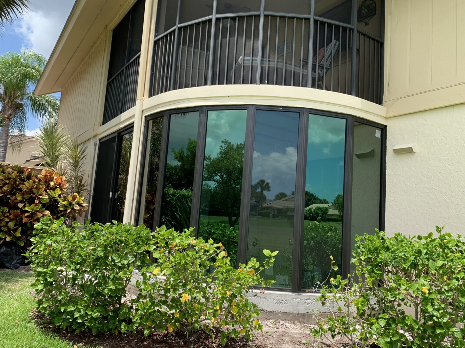 Curved impact windows on a residential home